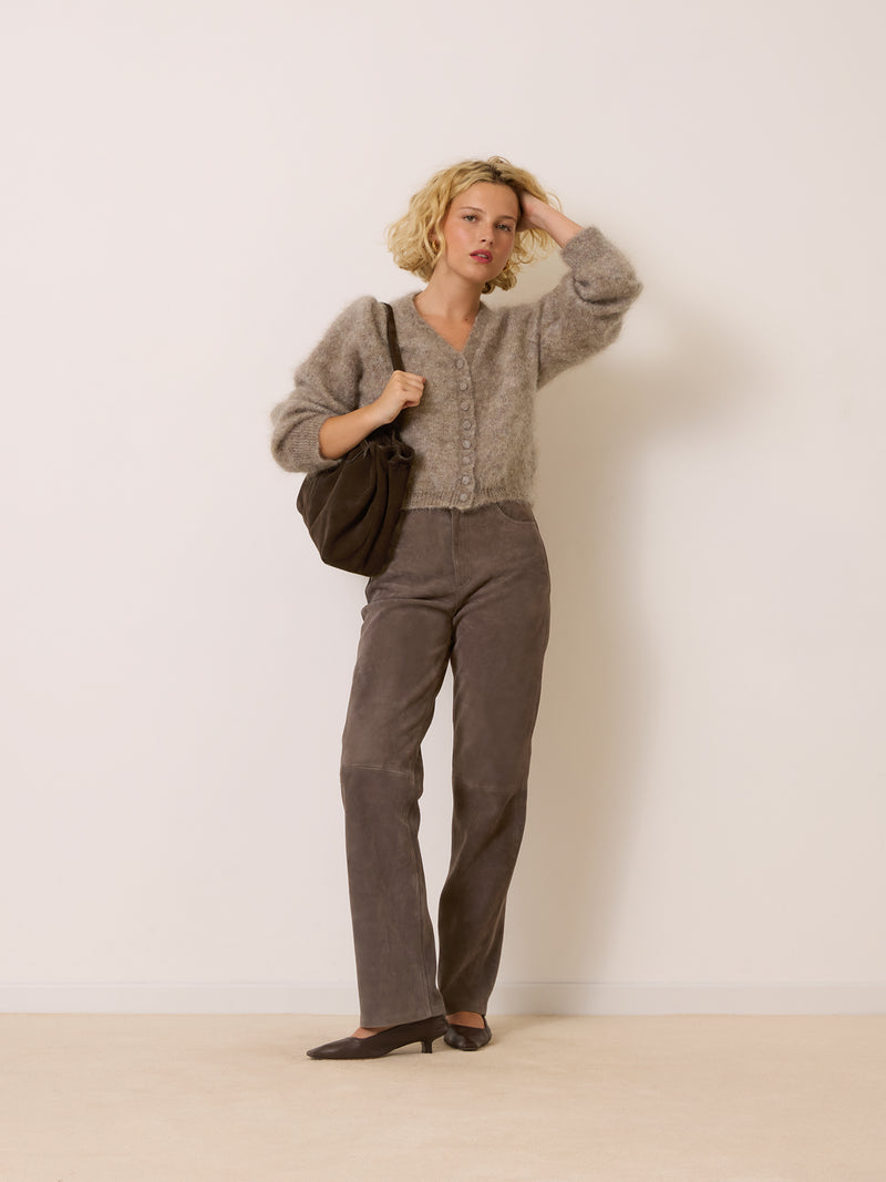 GERMAIN taupe suede trousers worn on a model by Rouje