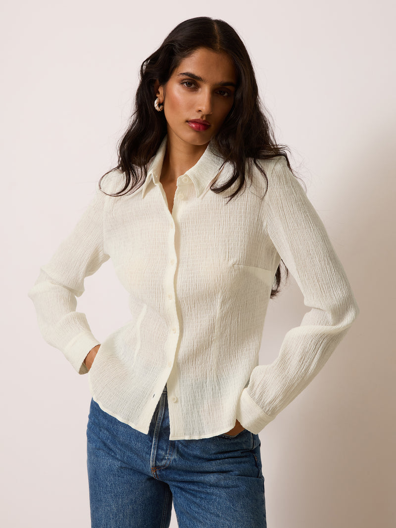 PALMYRA white crinkle shirt worn on a model by Rouje