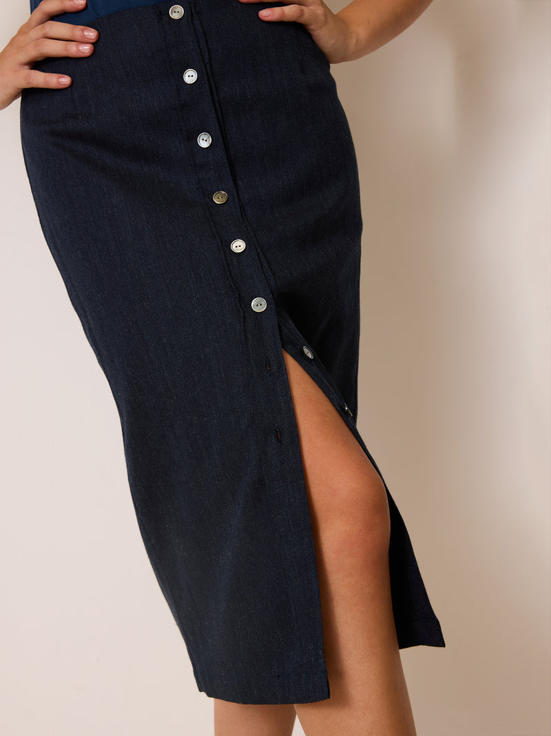 ZVEA denim blue buttoned midi skirt worn on a model by Rouje