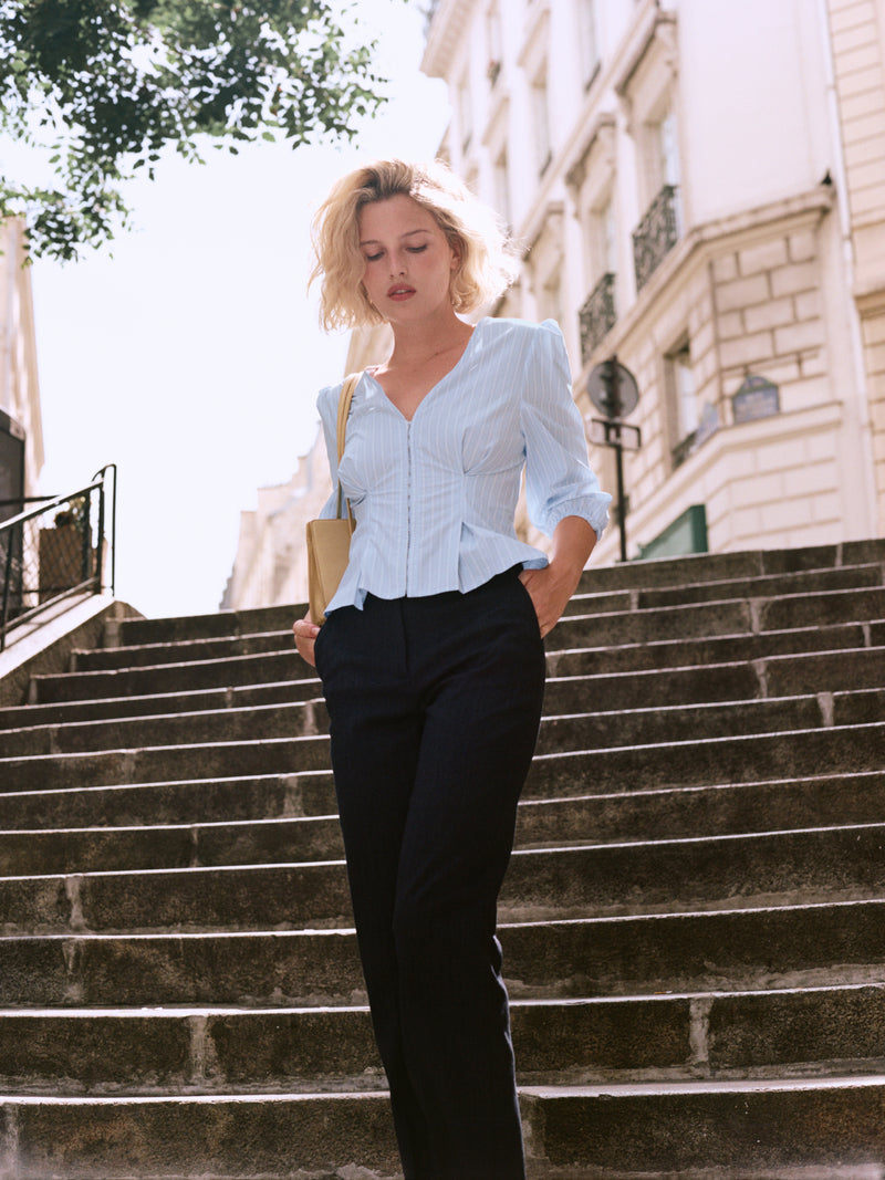 FRANCOISE denim blue wide trousers worn on a model by Rouje